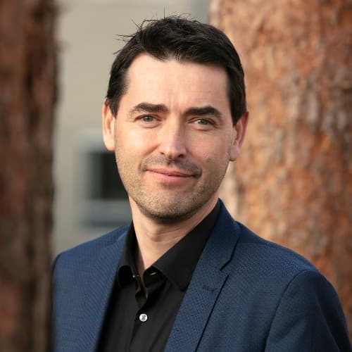 patrick Patrick De Boever, research manager at the University of Antwerp, in a blue blazer and black shirt