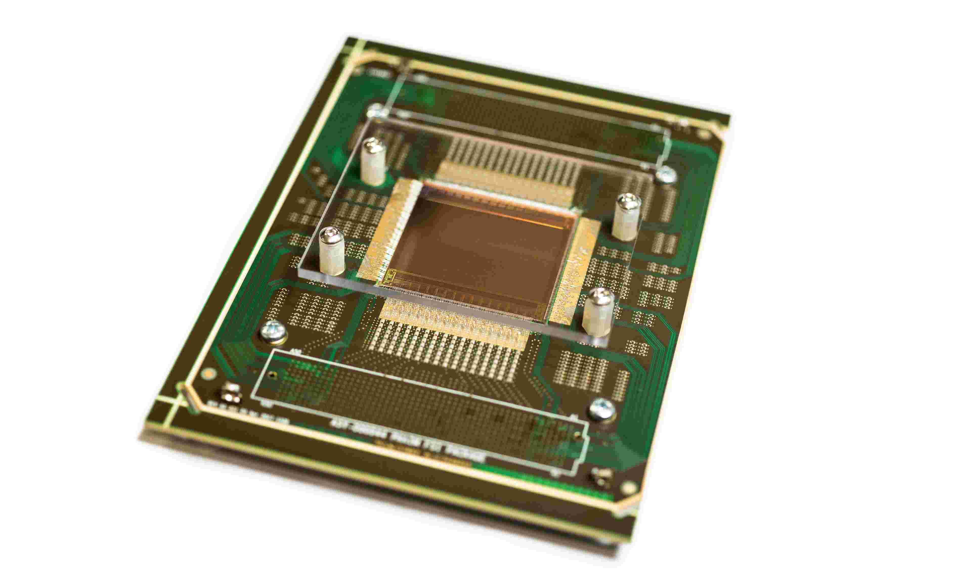 Ultra-high-speed CMOS imager chip on circuit board Ultra-high-speed CMOS imager chip mounted on a circuit board