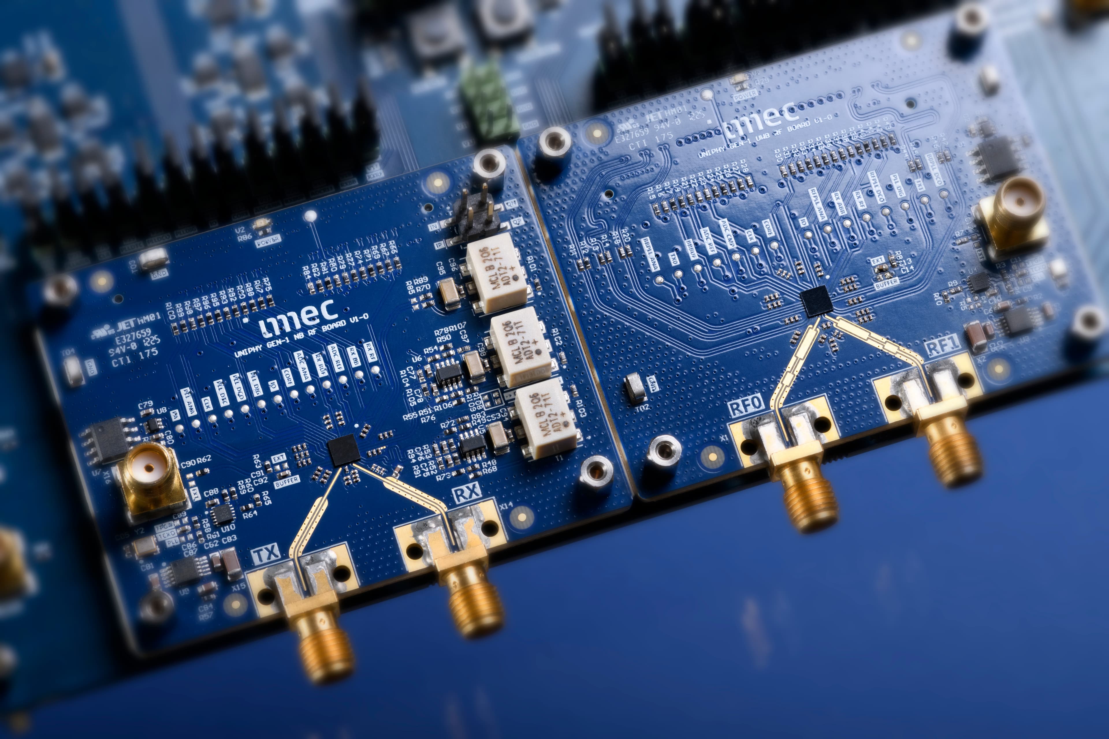 imec blue circuit board with RF connectors and chips Blue imec circuit board with RF connectors and chip components