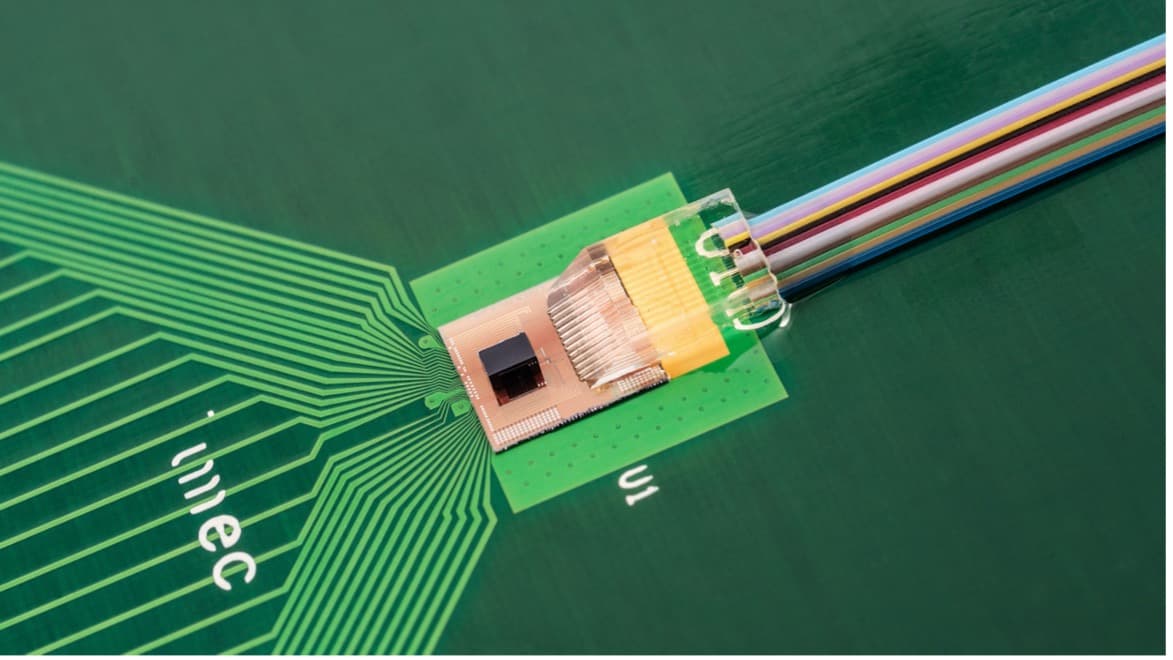 Photonics%20transceiver_0 Photonic transceiver prototype with a multicolor fiber cable attached to a circuit board