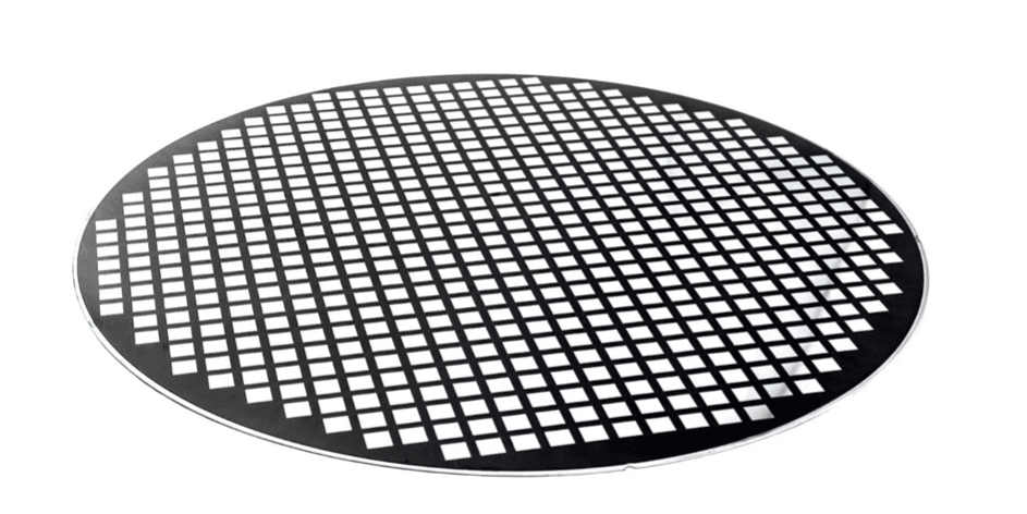 Silicon wafer with grid of square dies Reconstructed silicon wafer covered with a grid of small square dies