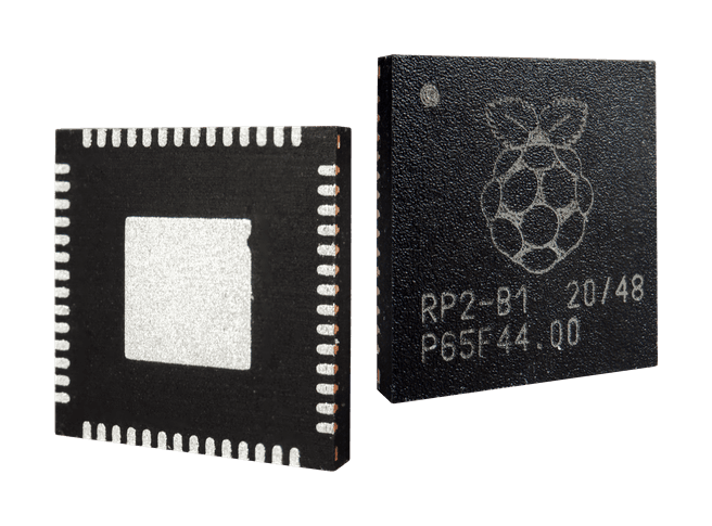Raspberry%20Pi%20IC-Link Two close-up Raspberry Pi chips, one showing the Raspberry Pi logo and chip markings