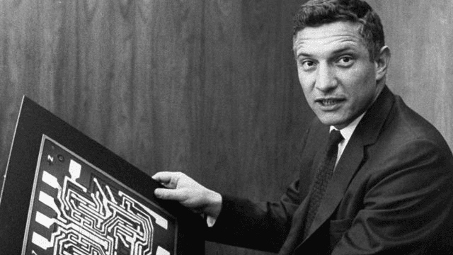 Robert%20Noyce Robert Noyce holds up an early integrated circuit board