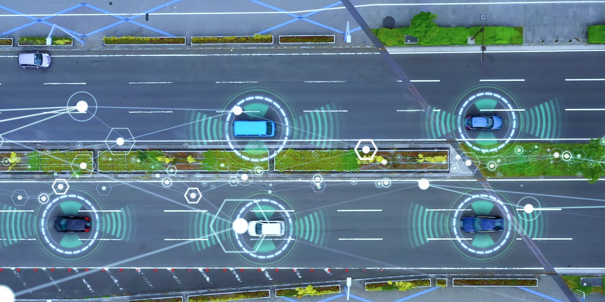 Solid-state-lidar-technology Overhead view of cars on a road with glowing lidar-style tracking rings and signal graphics