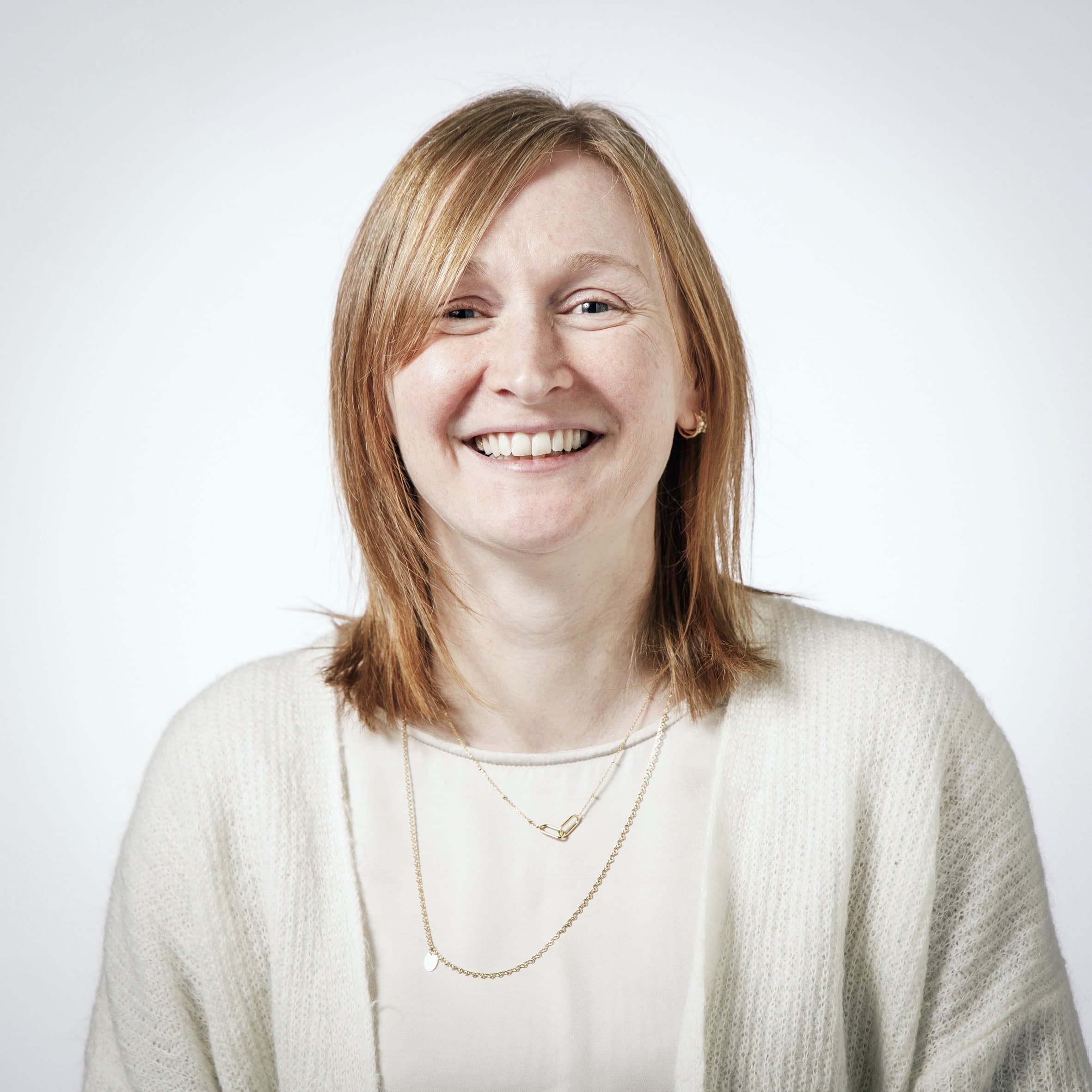 Veerle%20Bos_0 Portrait of Veerle Bos smiling against a white background
