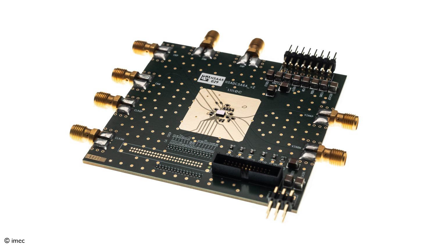 Imec CMOS ADC circuit board with RF connectors Imec CMOS ADC circuit board with multiple gold RF connectors and a central chip package