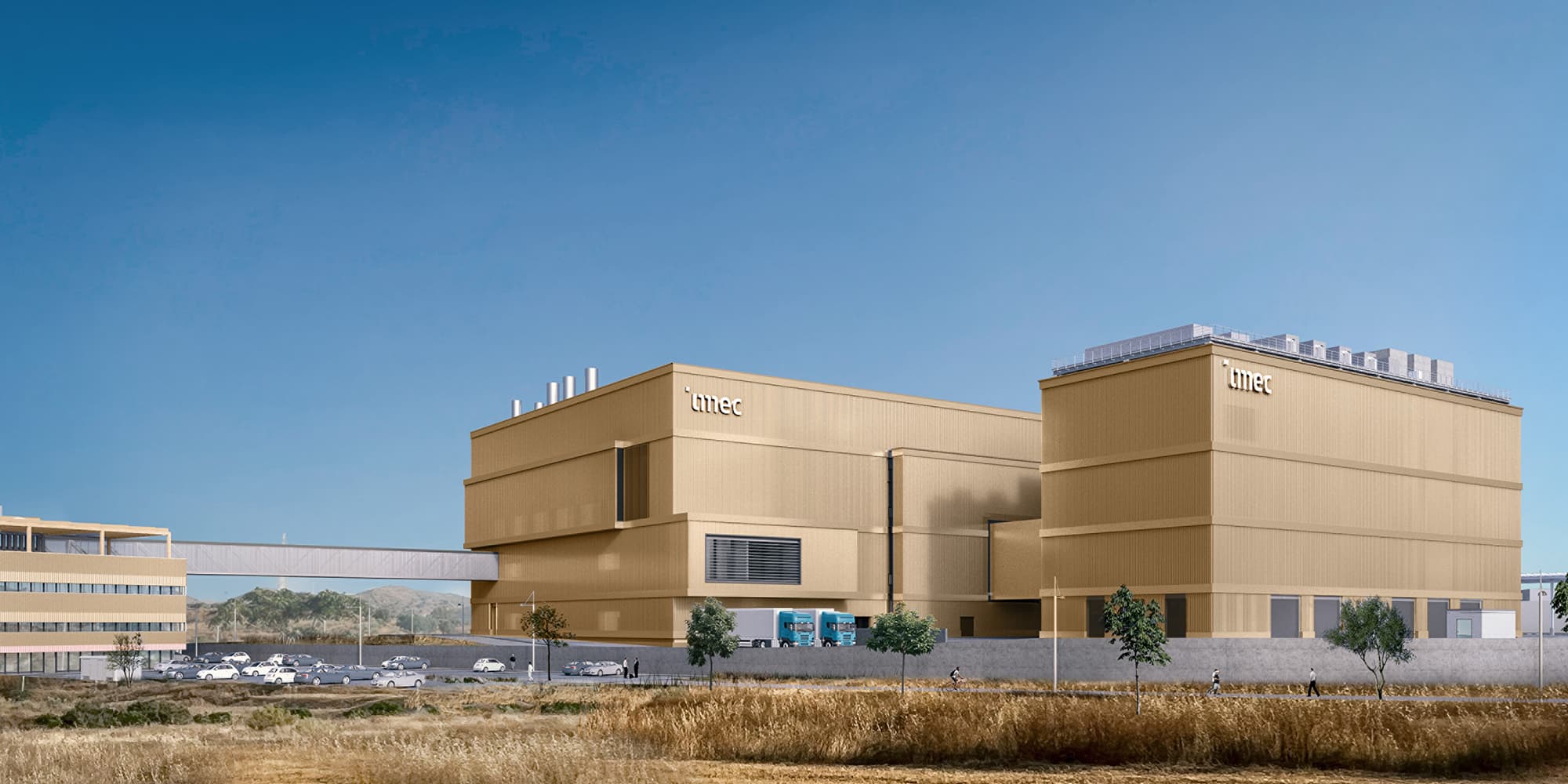 spain-office-render-002 Rendering of imec’s future Málaga semiconductor facility with large beige buildings under a blue sky